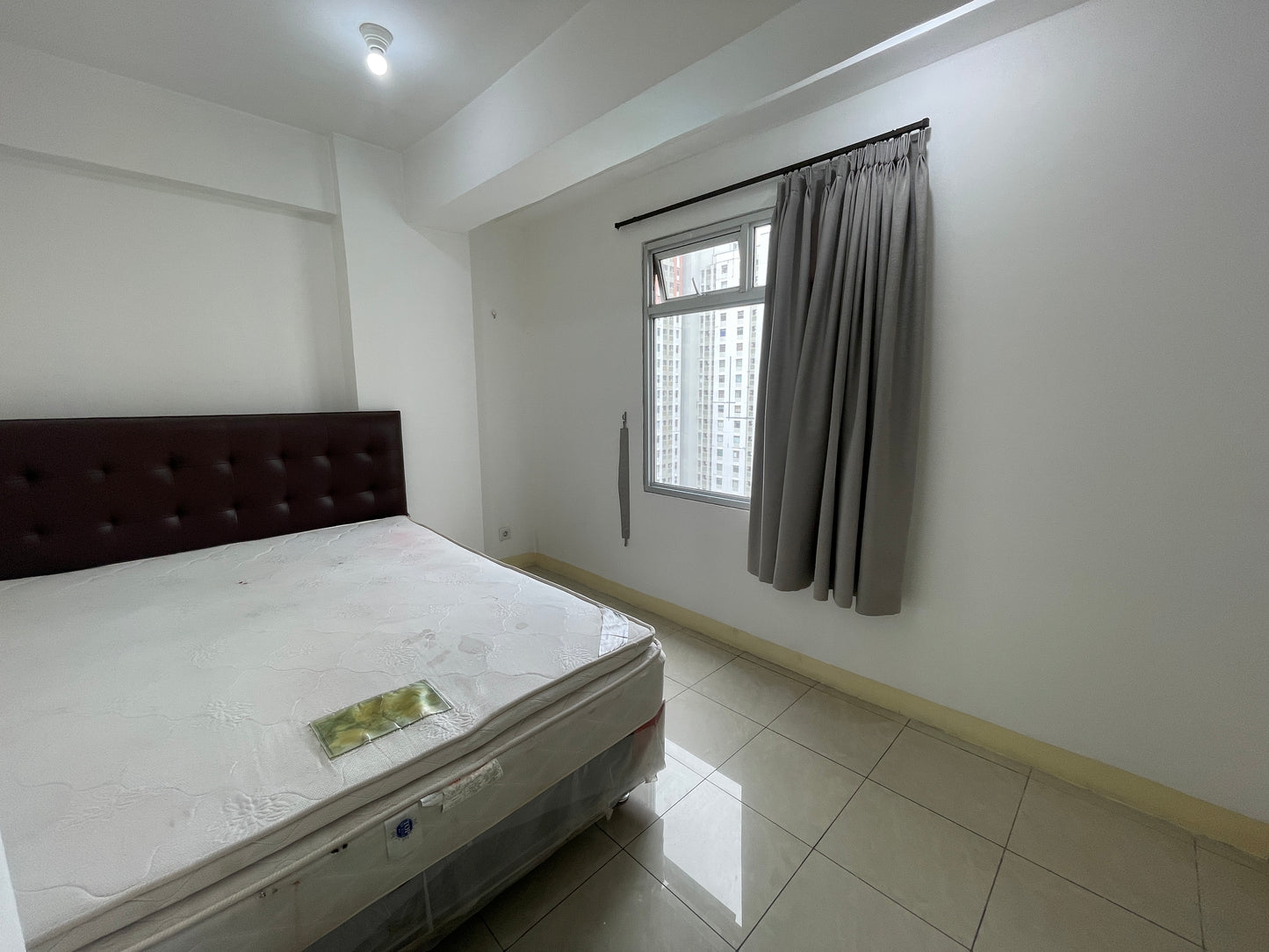 JUAL BU TERMURAH GREEN BAY PLUIT APARTMENT 2BR UNFURNISHED